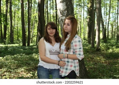 Tula, Tula Region, Russia - 08.10.2017: Summer Camp Holidays. A Female Counselor At A Summer Camp. A Blonde Girl. Portrait Of People Against The Background Of Nature. Happy People