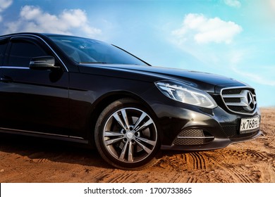 Tula region, Russia-July 14, 2018. Mercedes-Benz stands on the sand against the blue sky