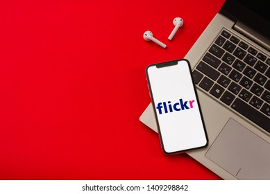 Tula, Russia - May 24,2019: Apple iPhone X with Flickr logo on the screen on red background. - Image