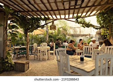 TULUM, MEXICO - August 2022: Cozy Stylish Cafe, Restaurant, Coffee Shop In Tulum, People In Cafe, Mexico