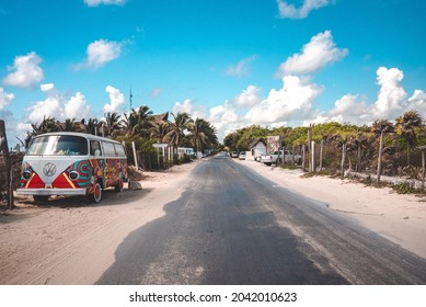 Tulum, Mexico. May 25, 2021. Closed Decorative Food Truck Van Parked On Side Of Empty Road Against Cloudy Sky