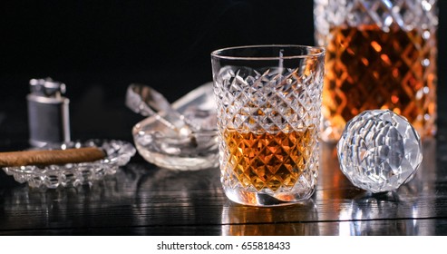 A Tumbler Of Whiskey And A Crystal Decanter