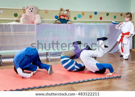 Tumbling on the mat are training small athletes