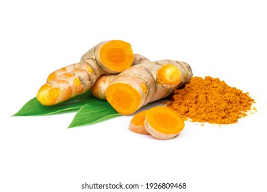 Tumeric rhizome with green leaf and pile of turmeric powder isolated on white background.