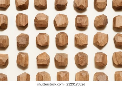 Tumi Ishi Japanese Table Game Meditation, Background From Eco-friendly Wooden Polygonal Stones For Building High Tower, Pattern With Wood Blocks On Beige Paper Background, View From Above. 