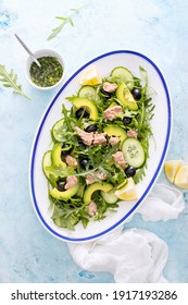 Tuna Arugula Salad Served In An Oval Dish, Top Down View Of The Meal 