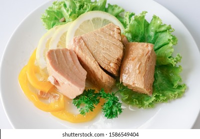 Tuna Chunk On White Plate.