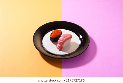 Tuna  And Egg Raw Caviar Sushi On The Top Of Ceramic Plate 