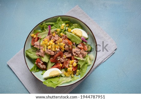 Tuna Fish Salad with Lettuce, Cherry Tomatoes, Cucumber, boiled eggs, onions and Corn