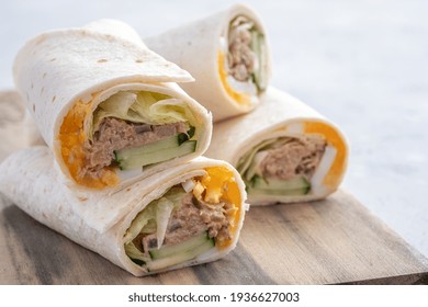 Tuna Melt Tortilla Wrap With Egg, Cucumber And Salad