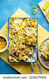 Tuna Pasta Bake with sweet corn. One pan easy, comfort food, blue background