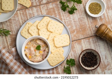 Tuna salad with butter cracker on a plate,snack food.Top view - Powered by Shutterstock