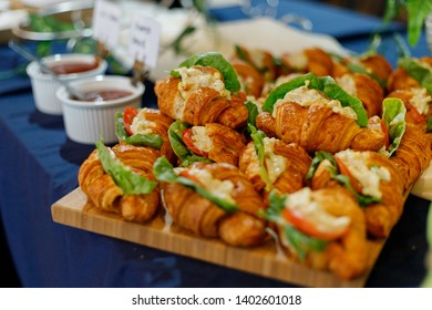 Tuna Salad Croissant Rolls On A Party Platter.