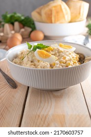 Tuna Salad With Mayonnaise, Boiled Eggs And Corn In A White Bowl. Served With Buns