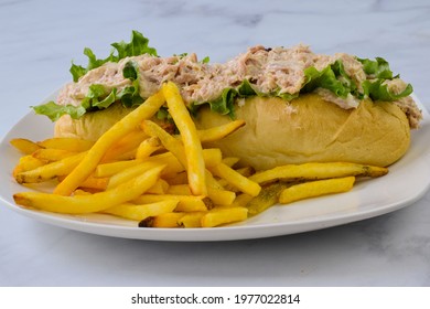 Tuna Salad Sub Roll With A Serving Of Fries