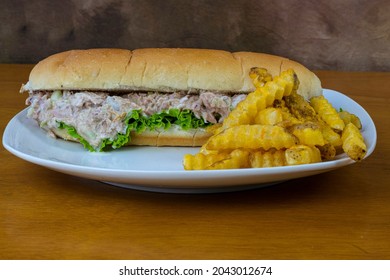 Tuna Salad Sub Served With A Side Of Fries