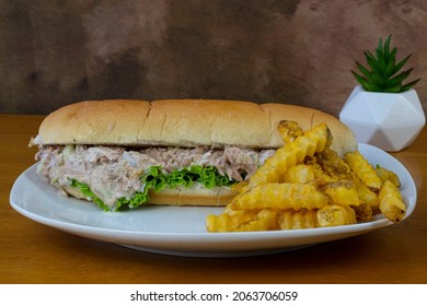 Tuna Salad Sub Served With A Side Of Fries