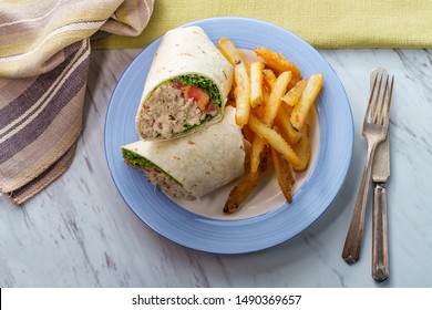 Tuna Salad Wrap Sandwich With French Fried Potatoes