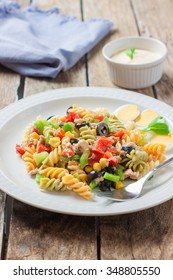 tuna and sauce pasta salad with fork - Shutterstock ID 348805550