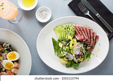 Tuna Steak Salad With Sliced Avocado And Lettuce Overhead View