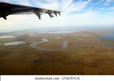 Tundra with lakes and rivers plane view before landing in Anadyr, Chukotka, Far East Russia
