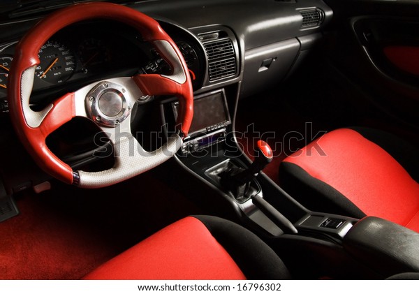 Tuned sport car.\
Luxury red velvet\
interior