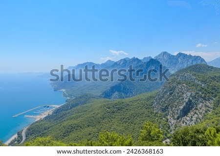 From the Tunektepe Cable Car, a panoramic view of Antalya coast in Turkey. The clear blue sky completes this breathtaking vista, showcasing the natural and urban beauty of Antalya city. Stock photo © 