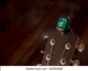 tuner for Guitar , E sound, sixth string, clip on guitar head - Shutterstock ID 654401869