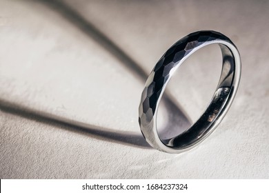 Tungsten Ring Standing With Light Reflection And Shadow.