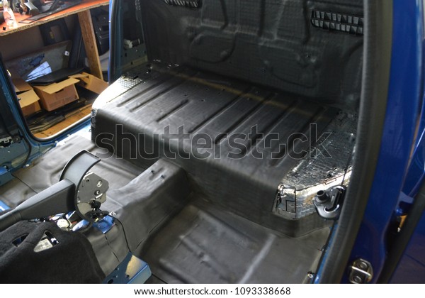 Tuning the car in a pickup truck body with\
three layers of noise insulation on the floor, under the seats and\
on the rear wall. Sound and vibration isolation using soft material\
with a car breakdown.