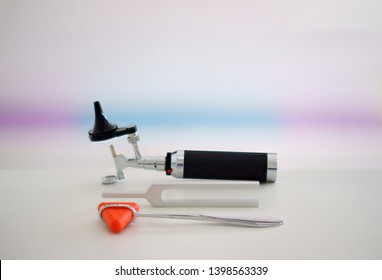Tuning Fork,Otoscope And Hammer Jerk On Floor ,top View With Copy Space
