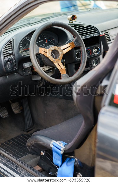 Tuning steering wheel and bucket seat in a interior\
of drift car