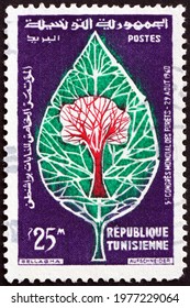 TUNISIA - CIRCA 1960: A Stamp Printed In Tunisia Shows Tree Superimposed On Leaf, 5th World Forestry Congress, Seattle, Washington, Circa 1960