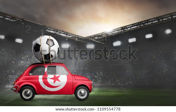 Tunisia flag on car delivering soccer or football
ball at stadium