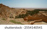 Tunisia old wreckage view ancient dwellings in desert. Chebika oasis in Tozeur Governorate panoramic sightseeing.