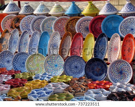 Similar – many part colorful tin buckets at the flea market