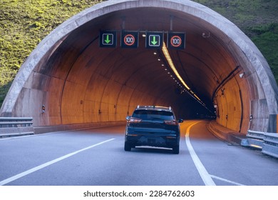 Tunnel entrance. Tunel do Marão is a road tunnel located in Portugal that connects Amarante to Vila Real, crossing the Serra do Marão. - Powered by Shutterstock