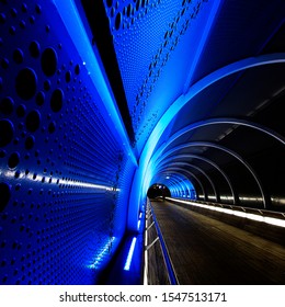 a tunnel full of patterns executed in arches
