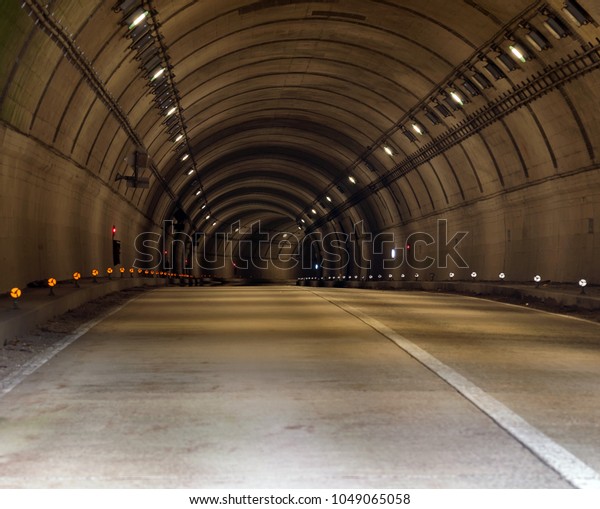 Tunnel Road with two lane\
highway
