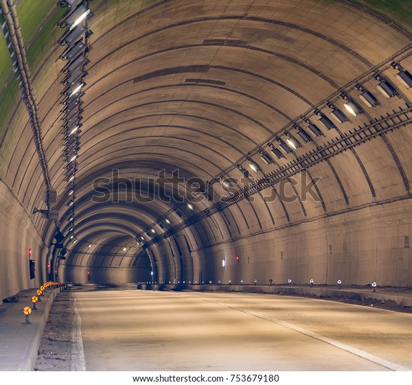 Tunnel Road with two lane\
highway