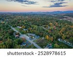 Tupper Lake NY Adirondacks Tri Lakes Region looking north Rt 30 fall aerial sunset