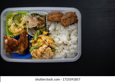 Tupperware With Food Over The Table