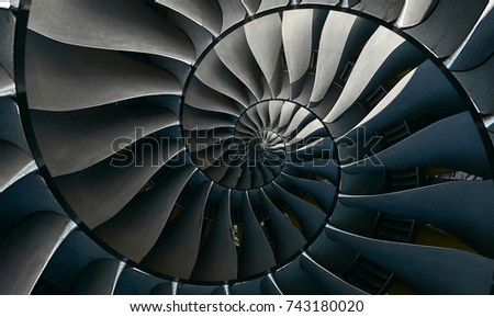 Turbine blades wings spiral effect abstract fractal pattern background Spiral industrial production metallic stair background Turbine manufacturing technology abstract fractal pattern staircase
