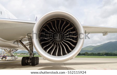 Turbine of engine airplane in airport background
