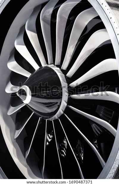 Turbine Engine. Modern aviation\
technologies. Aircraft jet engine detail during\
maintenance.