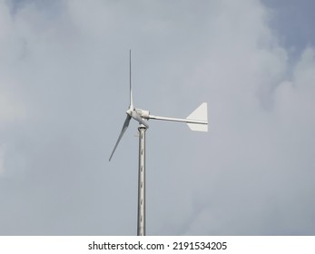 Turbine,General view of wind turbine in countryside landscape with cloudless sky. environment, sustainability, ecology, renewable energy, global warming and climate change awareness. - Powered by Shutterstock