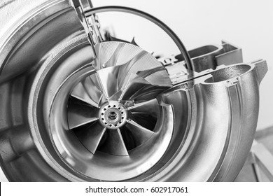 Turbocharger structure with cross section, black and white photo with selective focus