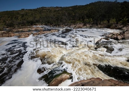 Turbulent force of water at Bell's Rapids on the confluence of the Swan and Avon Rivers near Baskerville, Western Australia.