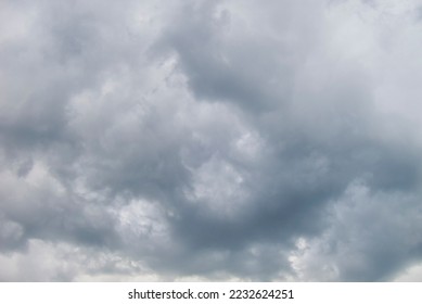 Turbulent grey clouds in daylight sky - Shutterstock ID 2232624251