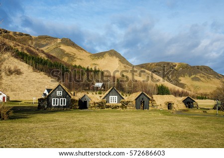 Turf farm houses in open air museum in Skogar village close to Skogafoss waterfall.